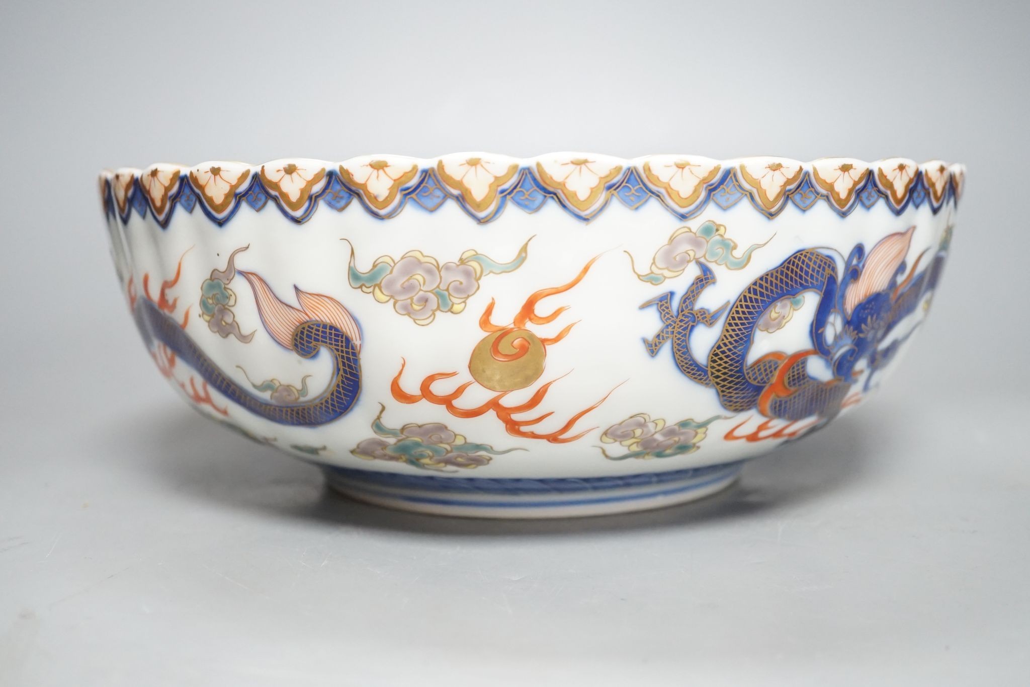 A Japanese Imari petal lobed bowl, by Fukugawa, 25 cms diameter.